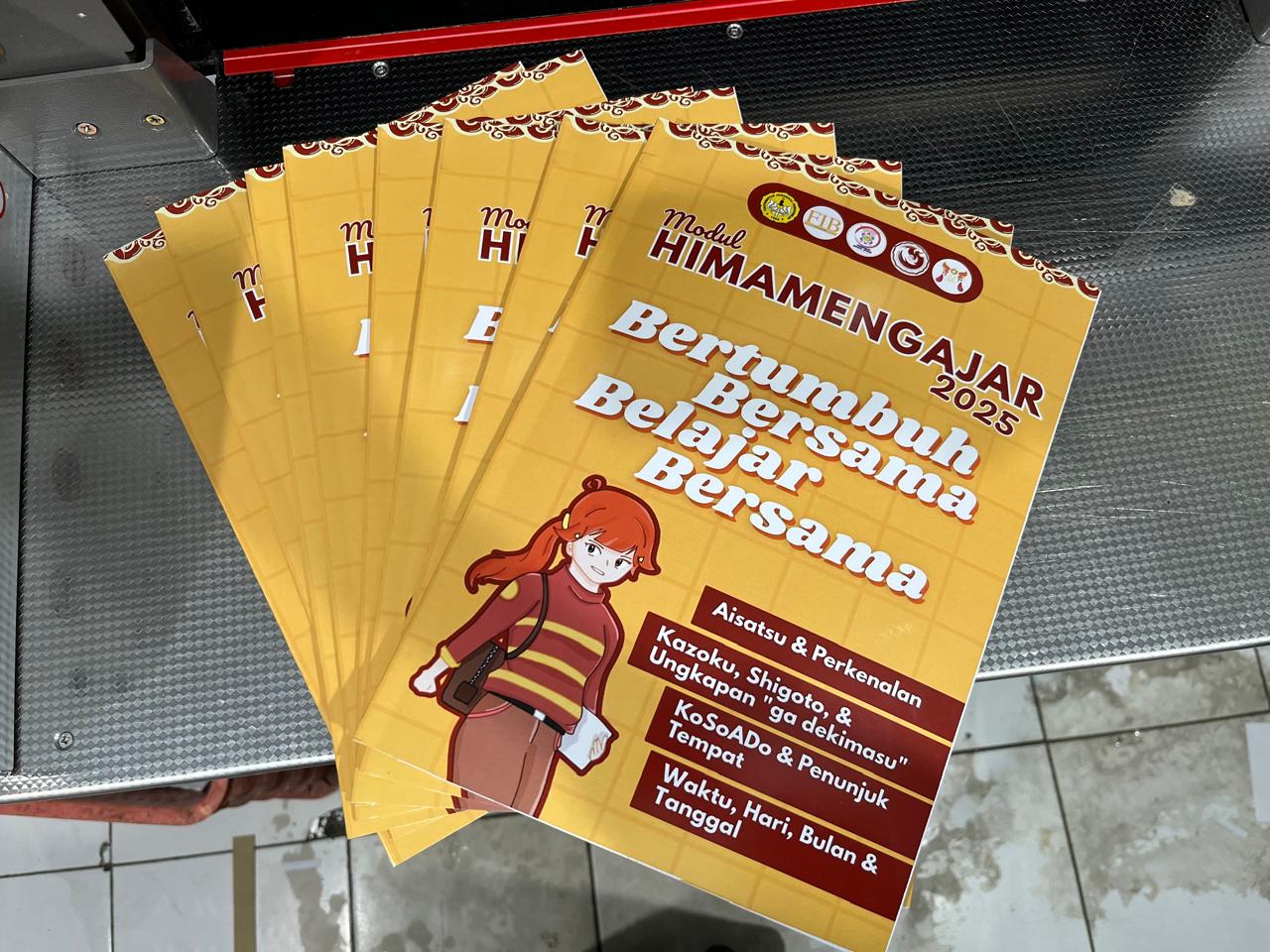 Cetak buku modul Hima Mengajar 2025